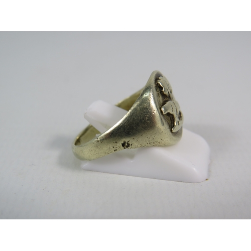 338 - White metal signet ring, finger size P. 7.7 grams