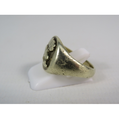 338 - White metal signet ring, finger size P. 7.7 grams