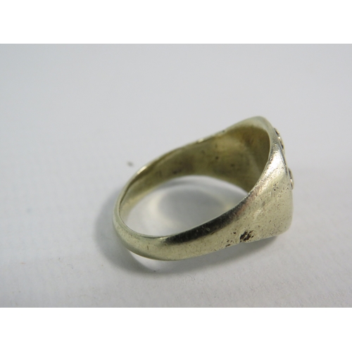 338 - White metal signet ring, finger size P. 7.7 grams