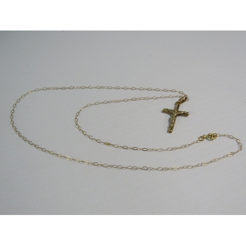 349 - 9ct gold crucifix pendant on a 9ct gold trace chain 16