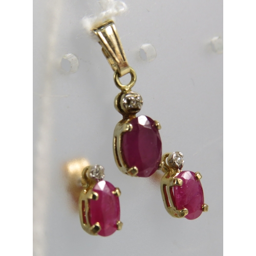 356 - 9ct gold ruby and diamond set pendant and matching earrings. 0.9 grams