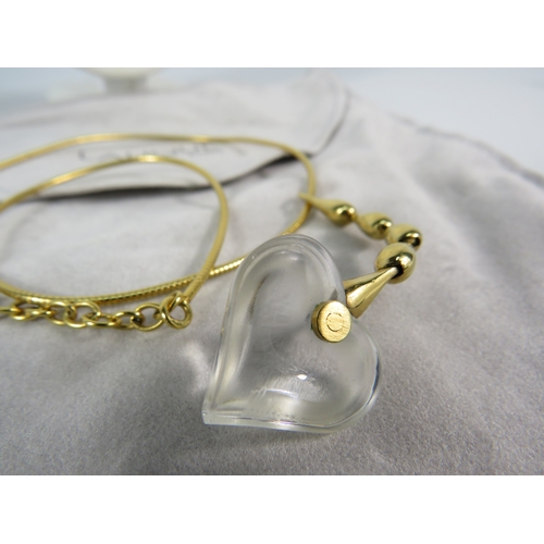 368 - Lalique frosted glass heart shaped pendant (signed) on a yellow metal chain.