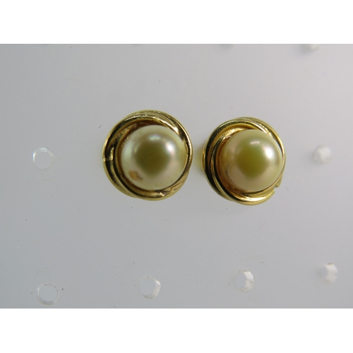 377 - 18ct gold pearl stud earrings, 2.5 grams