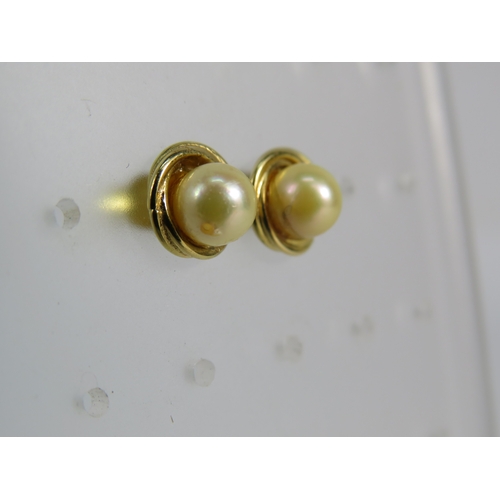 377 - 18ct gold pearl stud earrings, 2.5 grams