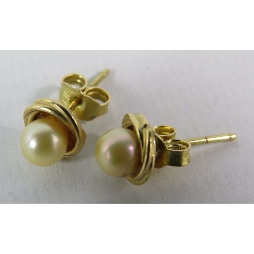 377 - 18ct gold pearl stud earrings, 2.5 grams