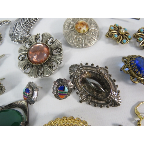 392 - Vintage costume jewellery brooches and earrings including Miracle and sterling silver.