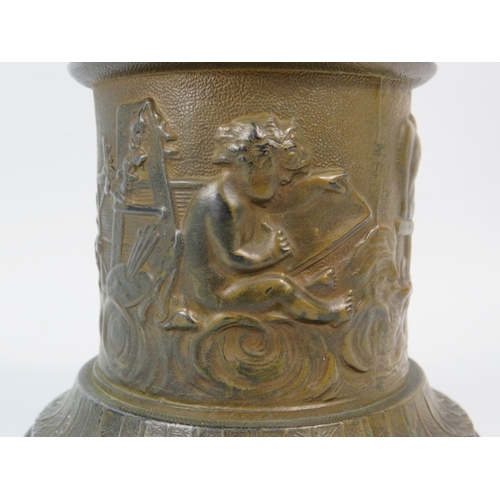 403 - A Bronze alloy figure of Hermes with a frosted glass flame shade, standing on a cherub decorated pli... 