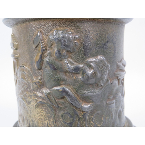 403 - A Bronze alloy figure of Hermes with a frosted glass flame shade, standing on a cherub decorated pli... 