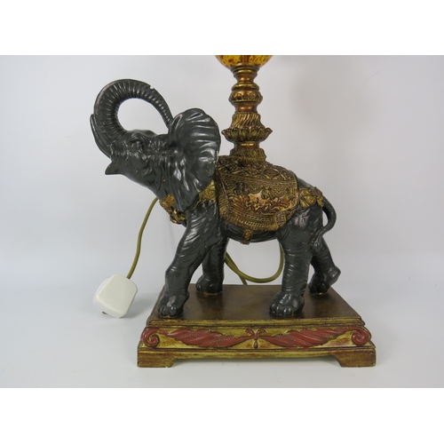 404 - Tiffany style table lamp with figural elephant base, 30