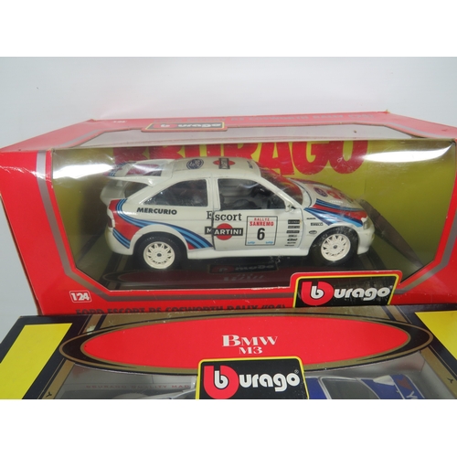 901 - Three Burago 1:24 Die Cast Scale models of Rally cars in original boxes. See photos for details.