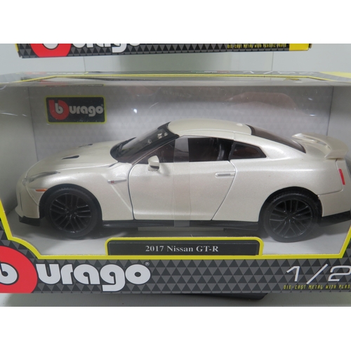 902 - Three Burago 1:24 Die Cast Scale models of cars in original boxes. See photos for details.