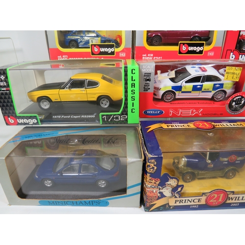 909 - Twelve 1:43 Scale Die Cast models by Maisto, Burago, Welly, Minichamps. All boxed and in unused cond... 