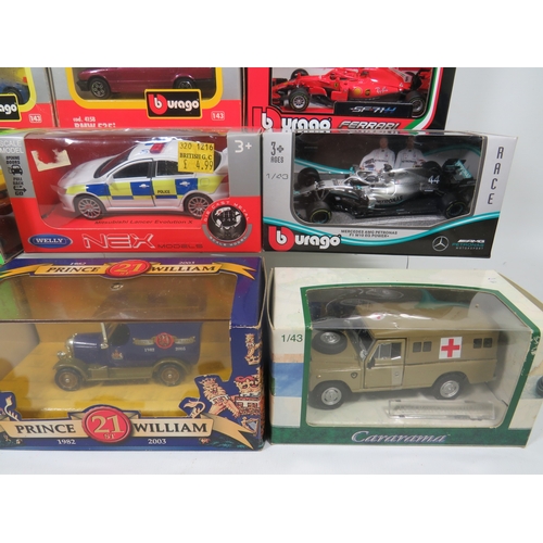 909 - Twelve 1:43 Scale Die Cast models by Maisto, Burago, Welly, Minichamps. All boxed and in unused cond... 