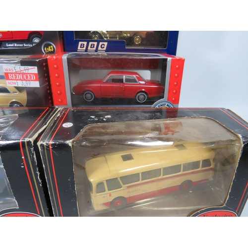 911 - Twelve Die Cast models of cars & coaches etc.  All boxed and in unused condition.  See photos for de... 