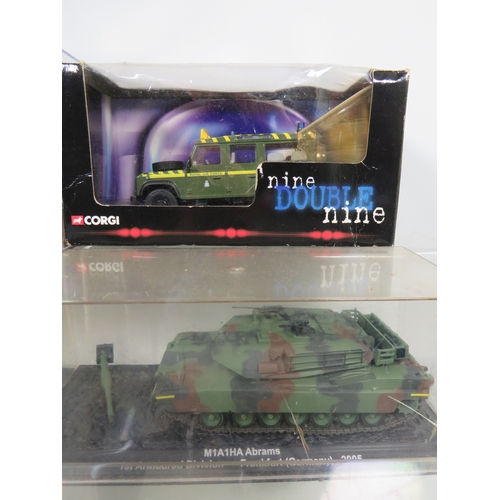 912 - Eight Die Cast Models of Military Armoured Vehicles, most set in perspex cases.  See photos