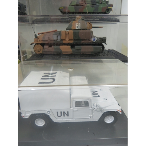 912 - Eight Die Cast Models of Military Armoured Vehicles, most set in perspex cases.  See photos