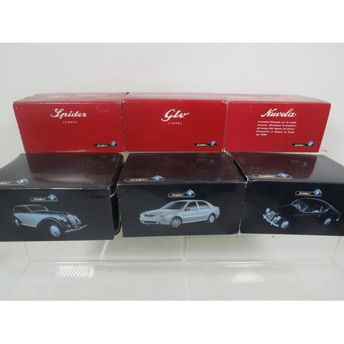 914 - Three Solido Die Cast Lancia models and Three Alpha Romeo Models with display tins. All in unused co... 