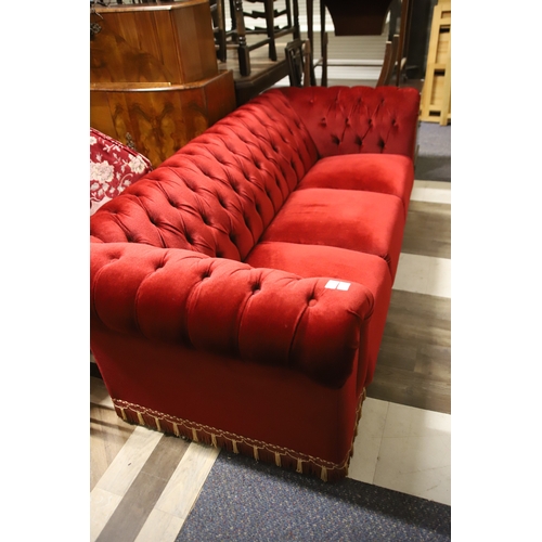 1228 - Three Seater Crimson Velour three seat chesterfield type sofa in very good condition. Measures appro... 