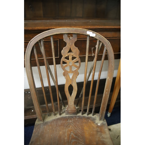 1259 - Two Vintage Wheelback chairs with Crinoline Stretcher. In as found condition and would benefit from ... 