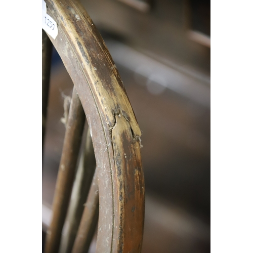 1259 - Two Vintage Wheelback chairs with Crinoline Stretcher. In as found condition and would benefit from ... 