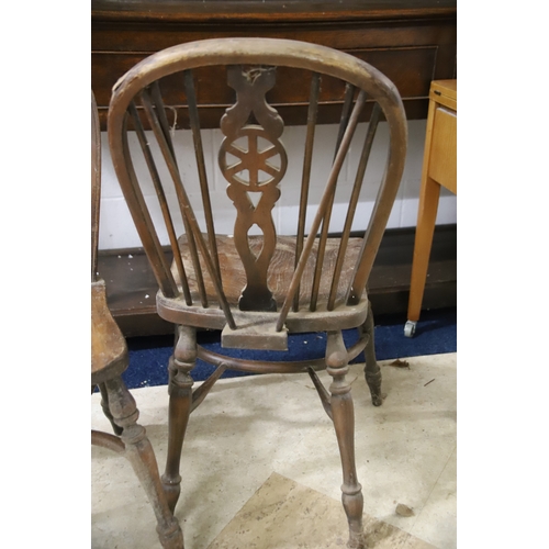 1259 - Two Vintage Wheelback chairs with Crinoline Stretcher. In as found condition and would benefit from ... 