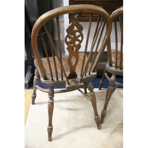 1259 - Two Vintage Wheelback chairs with Crinoline Stretcher. In as found condition and would benefit from ... 