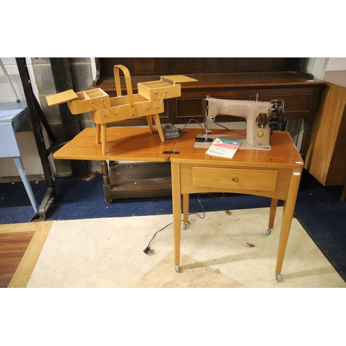 1260 - Vintage Singer Sewing machine with worktable together with cantilever sewing basket. Model Number 20... 