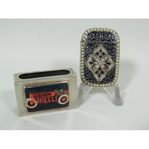 1000 - Sterling Silver Matchbox holder with an enamel panel decorated with Pirelli tyre advert plus a white... 