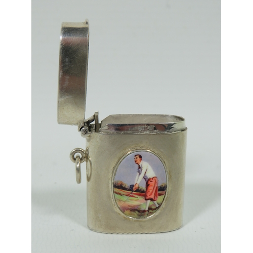 999 - Very Pretty Silver Vesta with an oval enamel cabouchon of a Golfer.  Measures approx 38 x 40mm  31.9... 