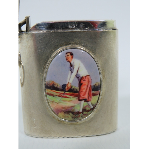 999 - Very Pretty Silver Vesta with an oval enamel cabouchon of a Golfer.  Measures approx 38 x 40mm  31.9... 