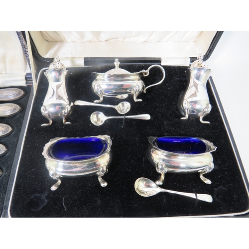 1024 - Boxed Vintage Silver Handled Butterknives plus a boxed Silver plated Cruet set. See photos