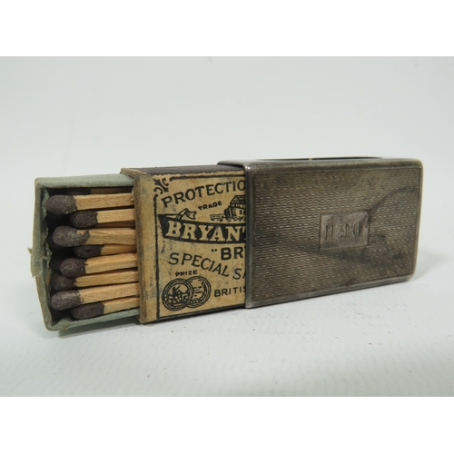 1028 - Hallmarked Silver Matchbox holder complete with vintage matchbox and contents.  Measures approx 43 x... 