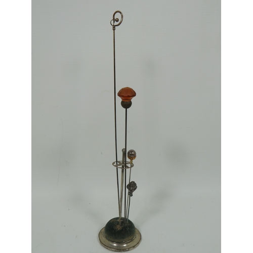 1036 - Hallmarked Silver Hatpin holder with some vintage hatpins.  One by Charles Horner. See photos