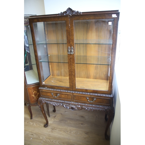 1272 - Reproduction Queen Ann style Two Glazed door display cabinet in fair condition (Ex Potters Display C... 