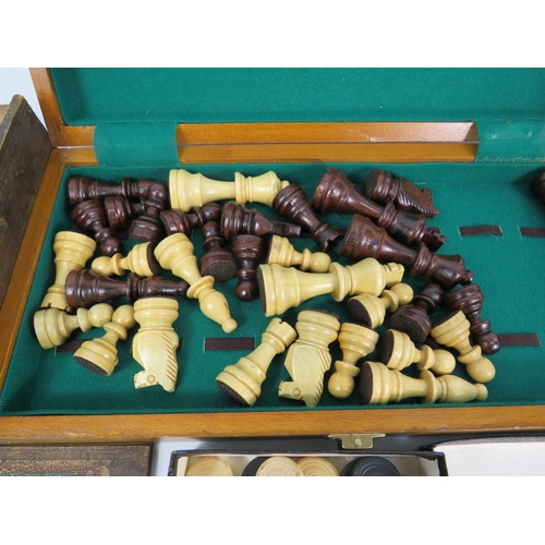 1494 - Two vintage chess sets, folding chess board and set of draughts.