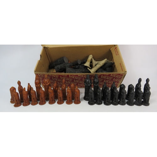 1496 - A complete resin chess set plus a selection of misc chess pieces.