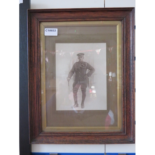 1163 - Framed under Glass photo of a WW1 British Soldier.  Frame measures approx 16 x 12 inches see photos