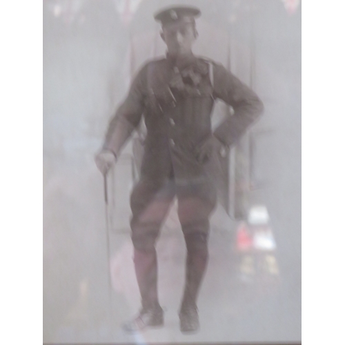 1163 - Framed under Glass photo of a WW1 British Soldier.  Frame measures approx 16 x 12 inches see photos