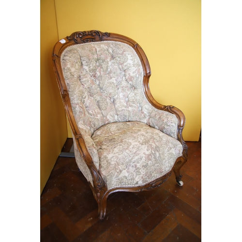 1388 - Nicely upholstered button back Walnut Victorian Armchair in good condition. Carved Detail to frame. ... 