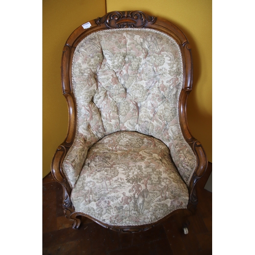 1388 - Nicely upholstered button back Walnut Victorian Armchair in good condition. Carved Detail to frame. ... 