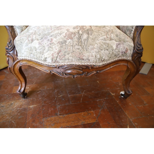 1388 - Nicely upholstered button back Walnut Victorian Armchair in good condition. Carved Detail to frame. ... 