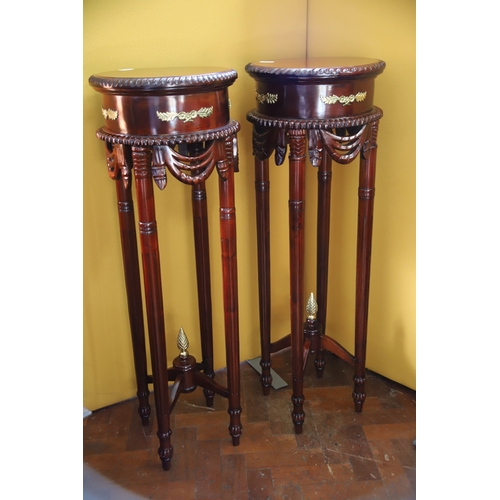 1702 - Pair of Hardwood Torchiers with brass details in very good condition.  H:43 inches. See photos.