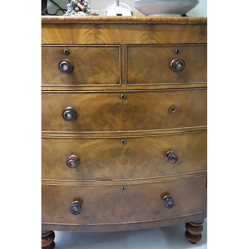 1705 - Bow Fronted chest with Burr Walnut Veneer, (Missing one handle) turned bun feet. See photos for cond... 