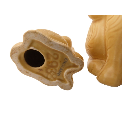 18 - Two Sylvac droopy eyed dog figures, the tallest stands 7