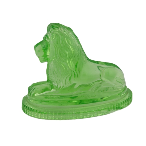 19 - Victorian John Derbyshire moulded Uranium glass lion with registration lozenger to the base. (chip t... 