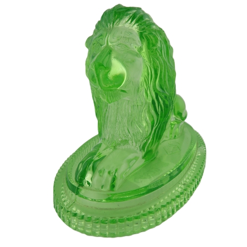 19 - Victorian John Derbyshire moulded Uranium glass lion with registration lozenger to the base. (chip t... 