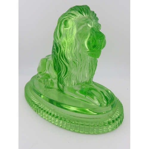 19 - Victorian John Derbyshire moulded Uranium glass lion with registration lozenger to the base. (chip t... 