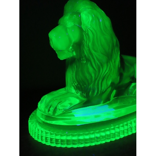 19 - Victorian John Derbyshire moulded Uranium glass lion with registration lozenger to the base. (chip t... 
