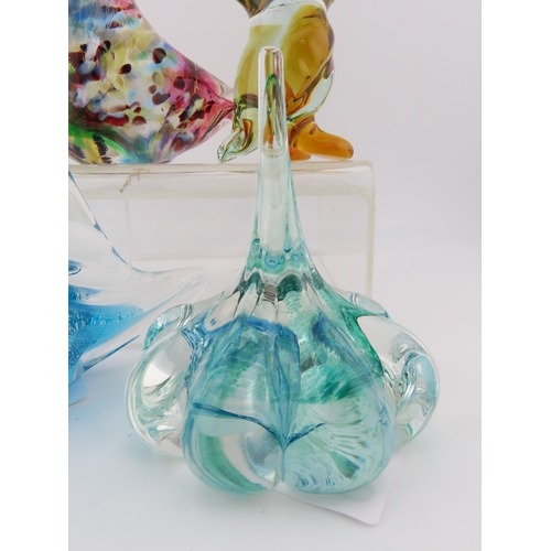 27 - Four art glass paperweights, Caithness, Murano and Avondale glass.