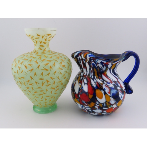 38 - Art deco uranium glass vase and a murano millefiori glass jug.